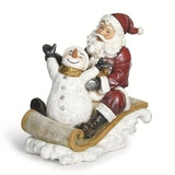 10"H SANTA SLEDDING WITH SNOWMAN FIGURE; JS - 633001