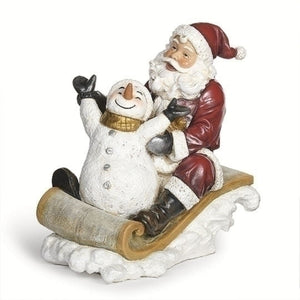 10"H SANTA SLEDDING WITH SNOWMAN FIGURE; JS - 633001