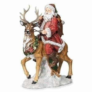 Joseph Studio Santa Riding Deer with Toys on Snow Base-663405